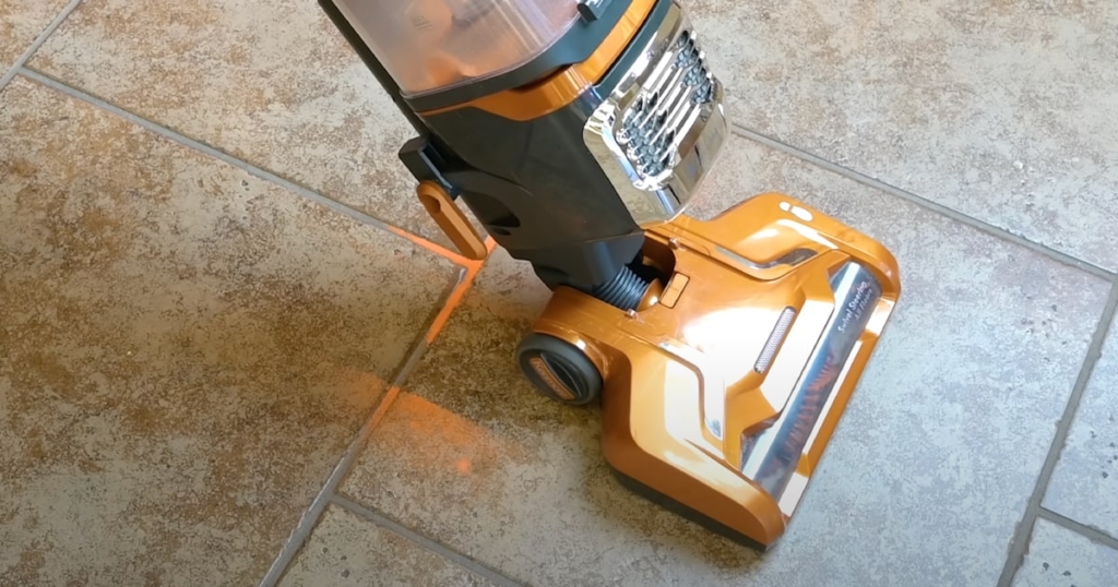 Vacuuming Tile Floor