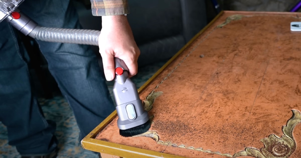 Dusting with a Vacuum Cleaner