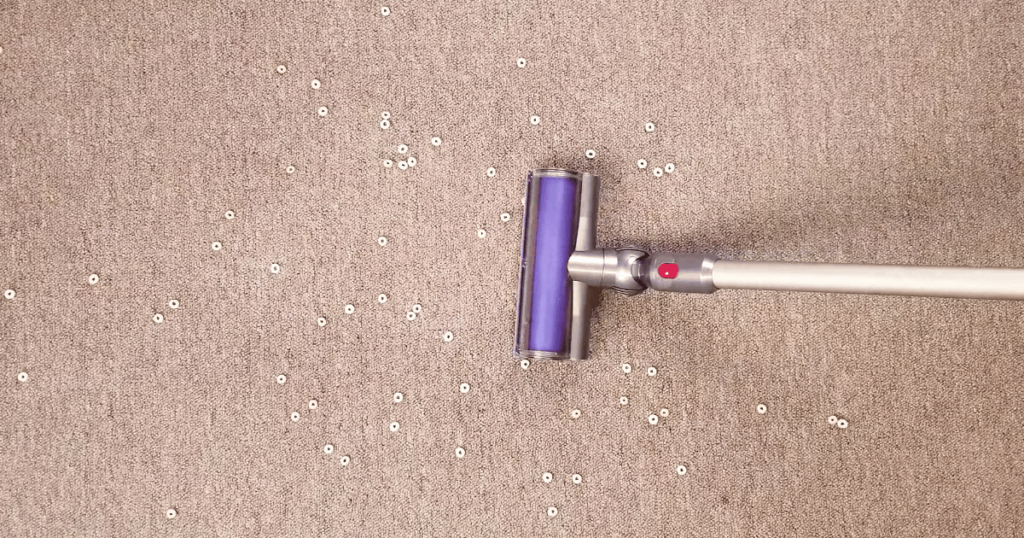 Cordless Vacuum on Carpet with Cheerios