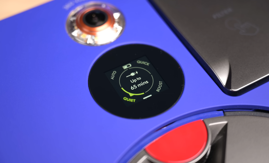 Close-up of the Dyson 360 Vis Nav robot vacuum's LED screen, displaying the battery life and power modes available.