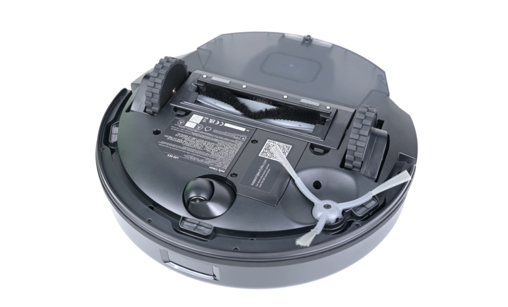 Underbelly view of the Eufy L60 Robot Vacuum showing the main brush and side brush components.