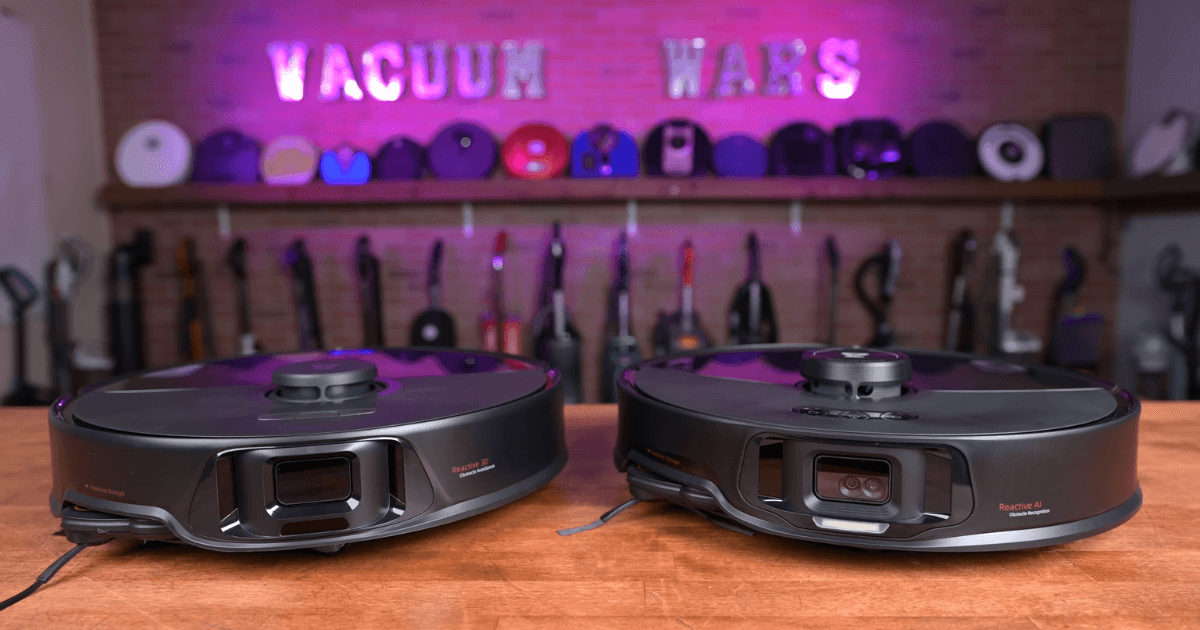 Two Roborock robot vacuum models, the S8 Max Ultra and S8 MaxV Ultra, displayed side by side on a wooden surface.