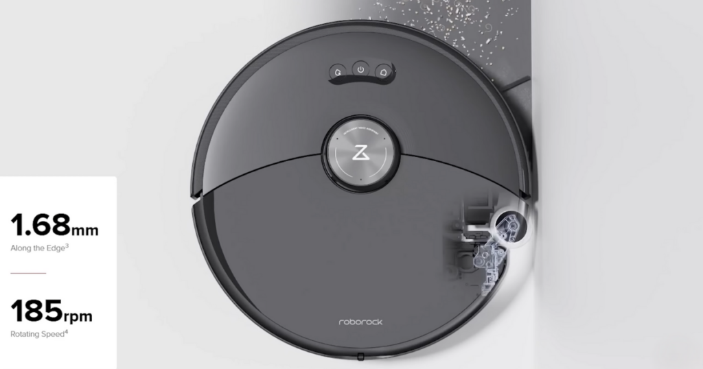 Top view of a Roborock robot vacuum cleaning along a wall. The image highlights the robot's edge cleaning capabilities with specifications showing 1.68 mm along the edge and 185 rpm rotating speed.