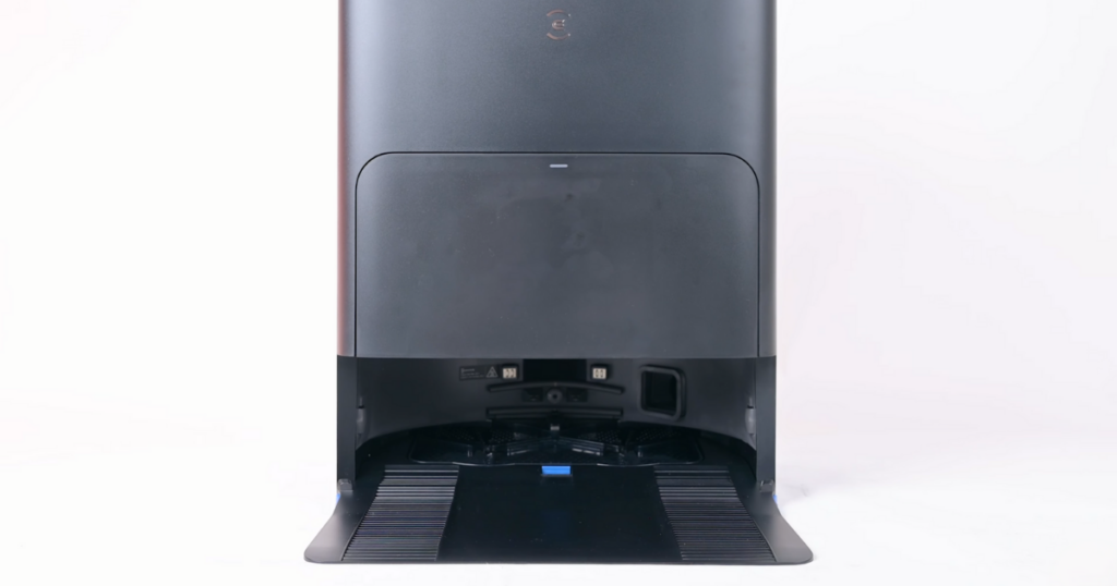 Close-up view of the Ecovacs Deebot T30S Omni Station, showing the docking area where the robot vacuum charges and empties its dustbin.