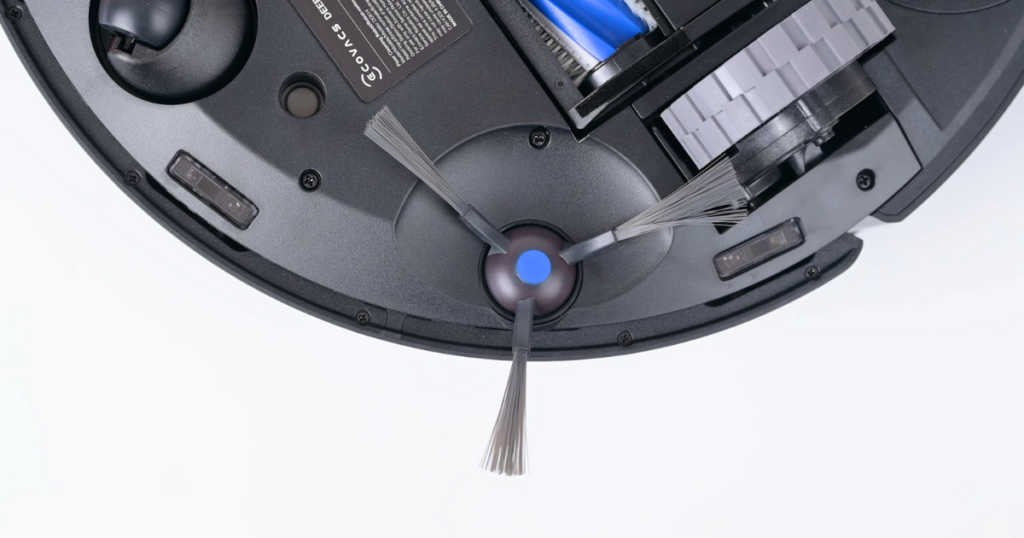 The underside of the Ecovacs Deebot T30S robot vacuum, focusing on the side brush and sensors.