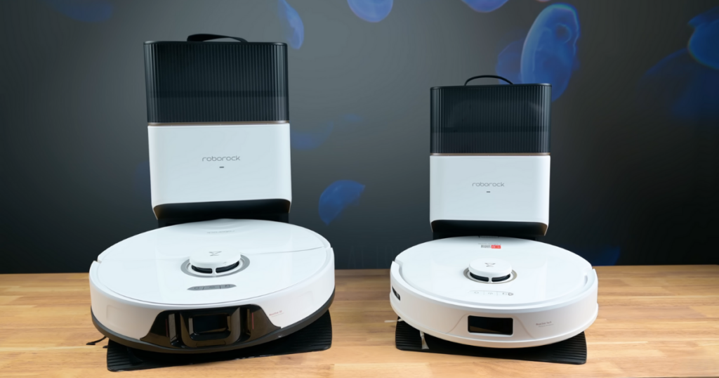 The Roborock S8+ (left) and Roborock Q8 Max+ (right) are positioned side by side on a wooden surface, each docked in their respective auto-empty bins. Both models feature a sleek white design with black and silver accents. 