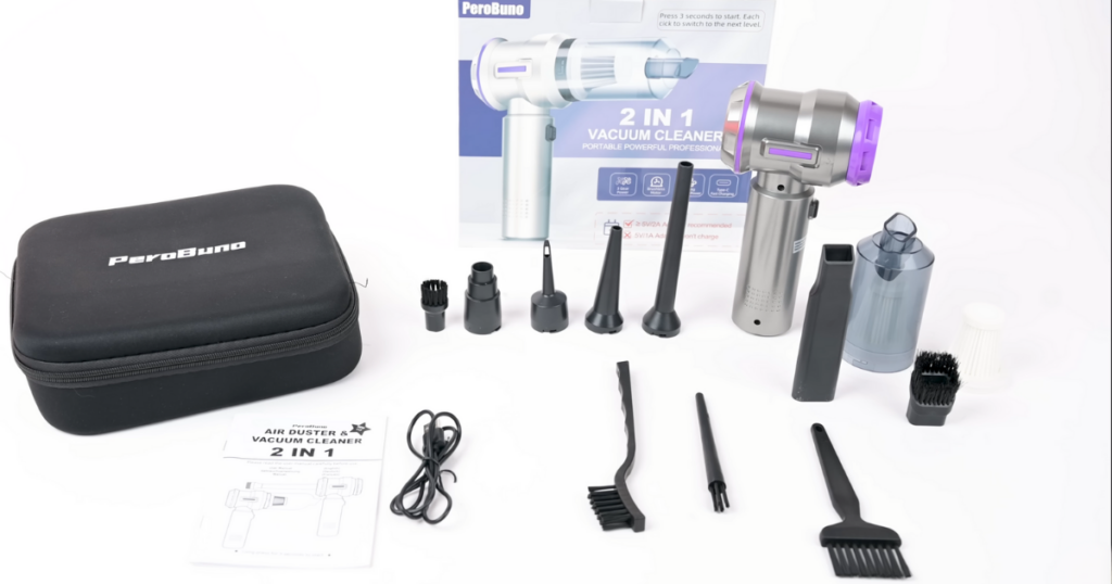 The PeroBuno 2-in-1 vacuum cleaner is displayed with all its accessories, including multiple attachments, a carrying case, a dustbin, a brush, a user manual, and a charging cable, arranged neatly on a white surface.