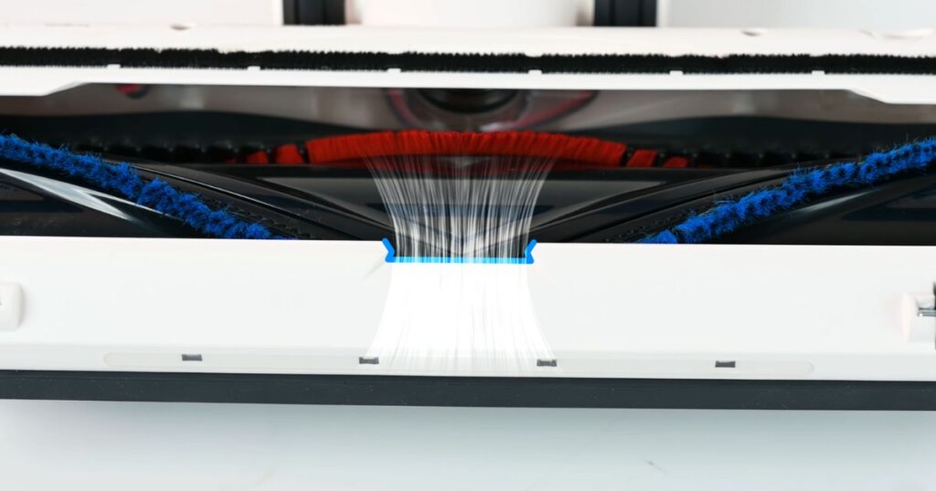 Underside view of a vacuum head with tightly sealed front air gates, optimized for carpet suction.