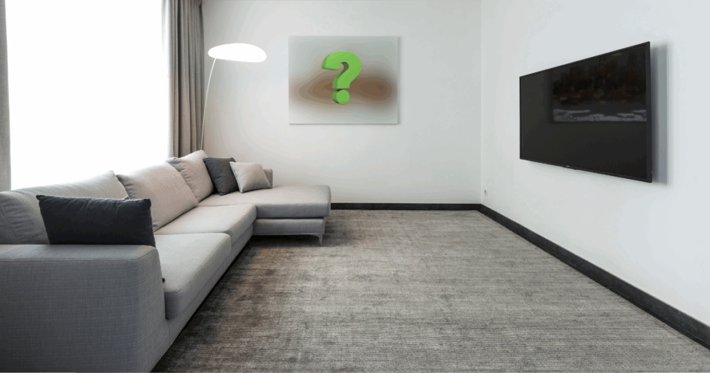 A serene room with a questionmark artwork print on the far wall.
