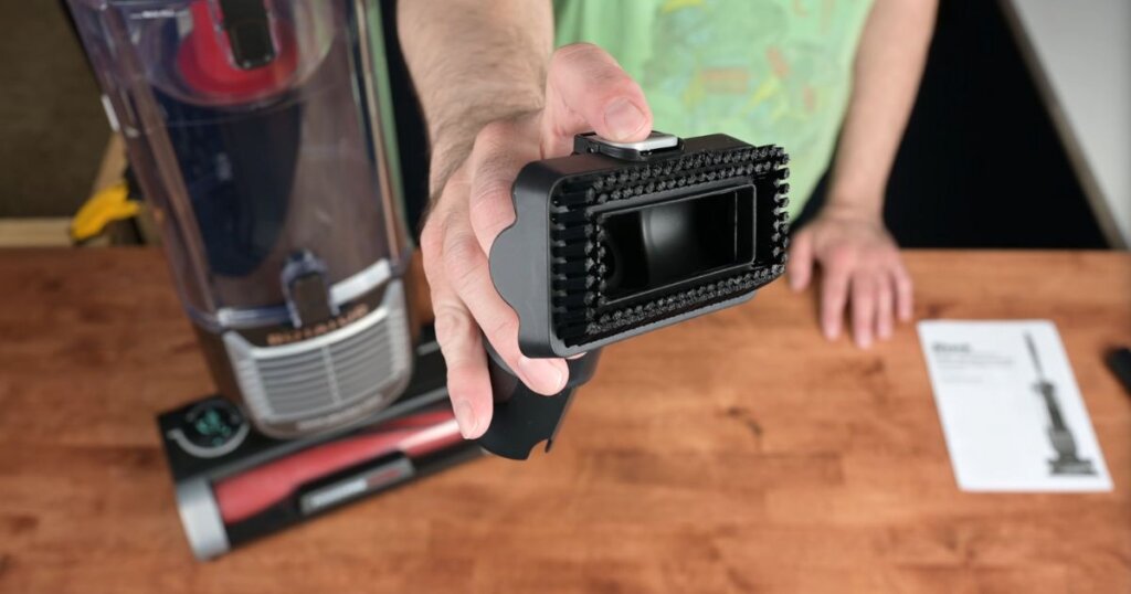 Close-up of Shark Rotator Pet ZU102 combo upholstery tool with stiff brush bristles.