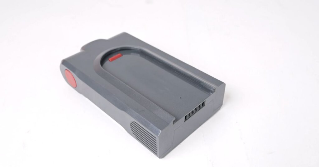 Image of the Smoture VAC01's removable battery pack placed on a white surface.