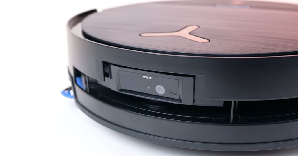 Close-up of Ecovacs Deebot X9 Pro Omni showing its front-mounted AIVI 3D camera sensor.
