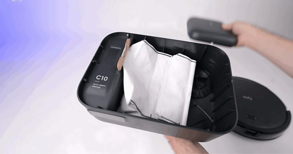 The Eufy C10 empties its dustbin into a 3L bag in the dock