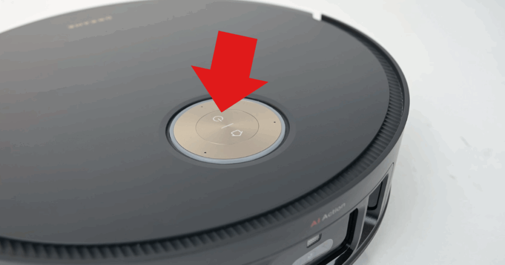 Press and hold the power button on top of your robot for three seconds to power it off, then again to restart it