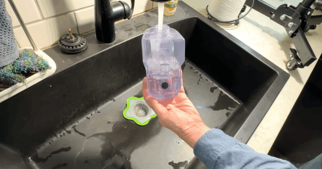 Filling the Shark Steam Pickup's water tank.