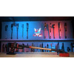 Dyson V16 Piston Animal Submarine 150 | Vacuum Wars Rifle mounted on a wall shelf with blue and red backlighting. The display includes a long gun on a shadowed shelf with various items above and below it.