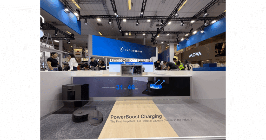 Ecovacs Deebot X11 OmniCyclone demonstrating PowerBoost Charging, which enables partial recharging during mop washing for continuous cleaning.