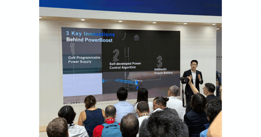 Slide highlighting Ecovacs’ PowerBoost innovations: GaN programmable power supply, self-developed power control algorithm, and 6400 mAh pouch battery.