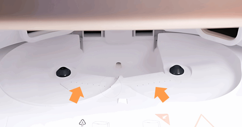 MOVA V50 Ultra robot vacuum dock washing mop pads with spray nozzles for consistent cleaning performance.