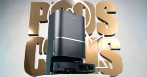 Dreame L50 Ultra robot vacuum in black with dock, standing against a background with large “Pros Cons” lettering.