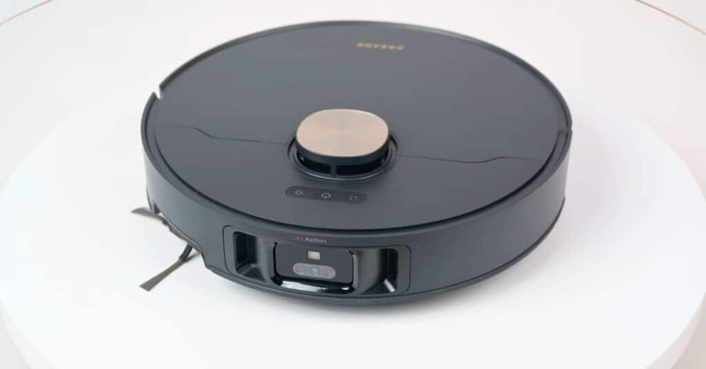 Dreame L50 Ultra robot vacuum close-up showing front-mounted RGB camera, lasers, and sensors.