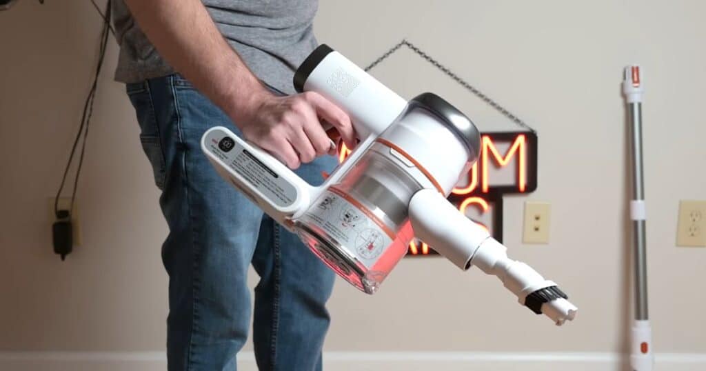 Tikom V500 cordless vacuum with Dyson-style upholstery tool and dusting brush attachment featuring longer bristles that are  designed for effective above floor cleaning.