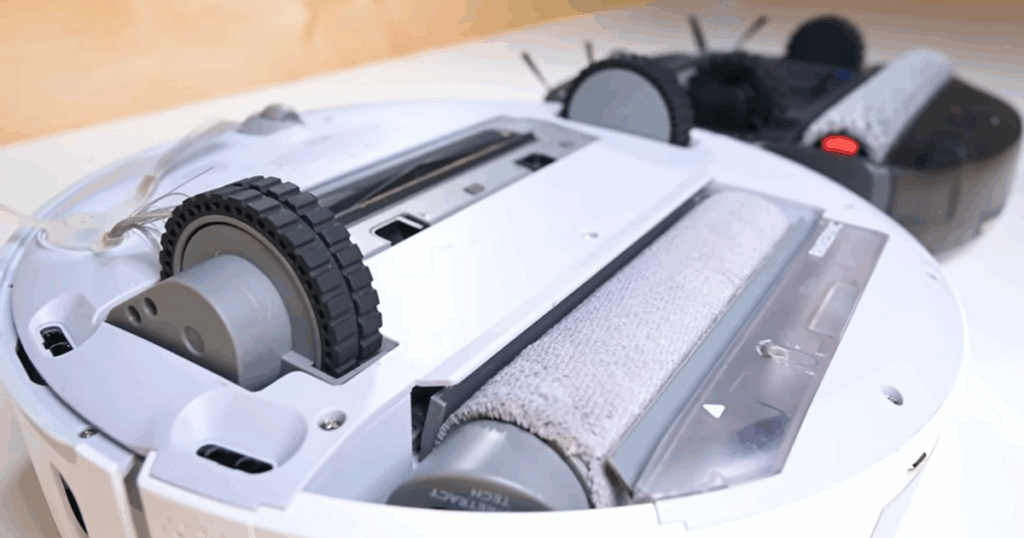A close up of cylindrical roller pads on robot vacuums