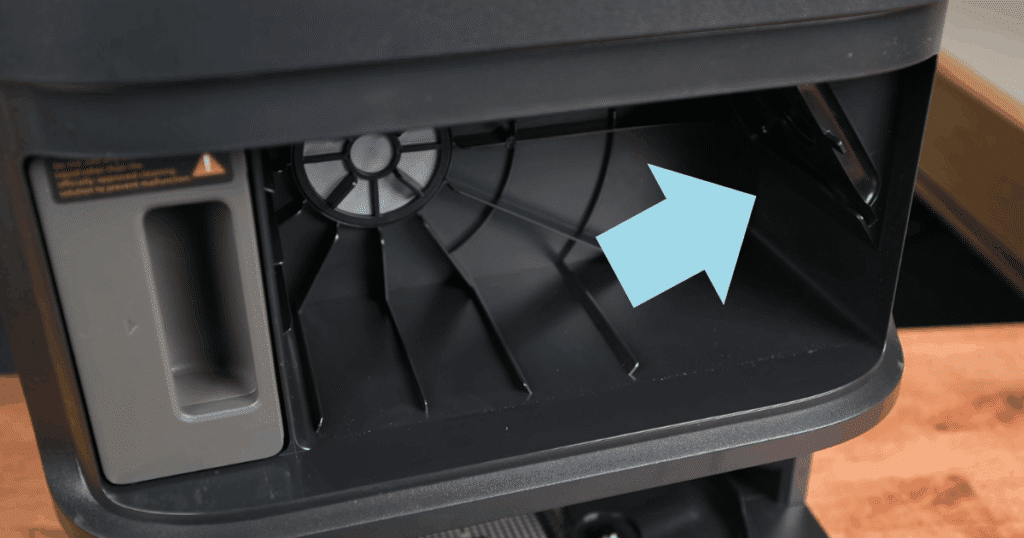 The point where the bag connects to the dock on a Dreame L50 Ultra, can become a choke point for debris on robot vacuums