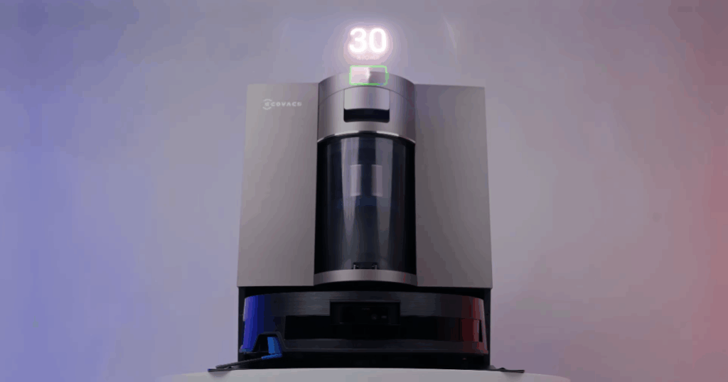 Ecovacs Deebot X11 OmniCyclone robot vacuum docked during Power Boost Charging, using its GaN Super Burst system to restore 6% battery in three minutes while washing the mop and emptying the dustbin.