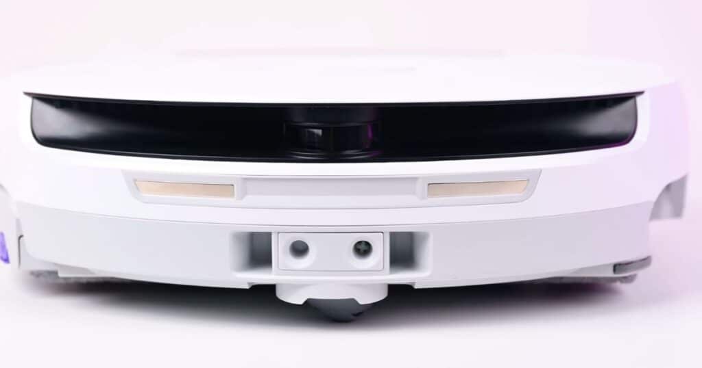 Close-up view of the Narwal Flow robot vacuum showing its semi-internal LiDAR turret and camera sensors.