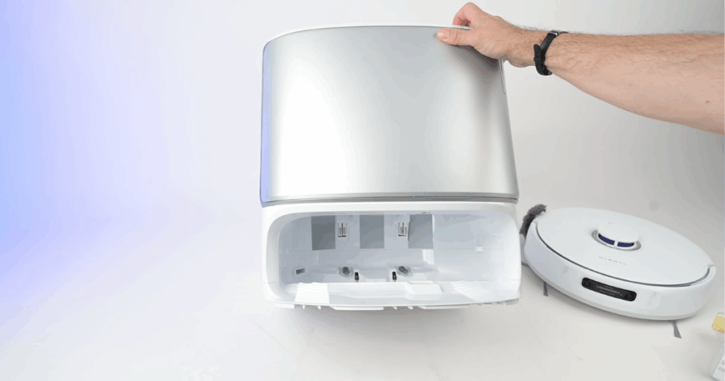 Automated base station of Narwal Freo Z10 Ultra shown with open lid, designed for mop washing, drying, water management, and self-emptying.