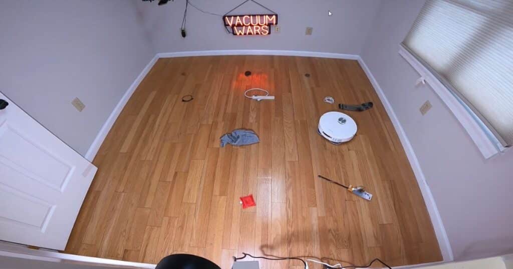 Dreame L40S Ultra AE navigation evaluations | Vacuum Wars Dreame L40S Ultra AE navigating around multiple items during obstacle avoidance evaluations