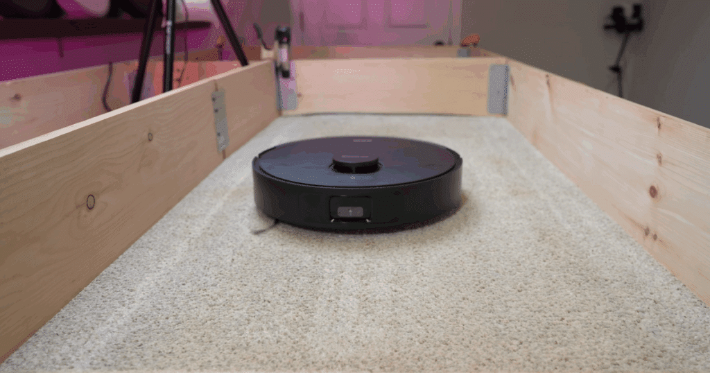 MOVA S10 robot vacuum deep-cleaning sand from carpet at Vacuum Wars