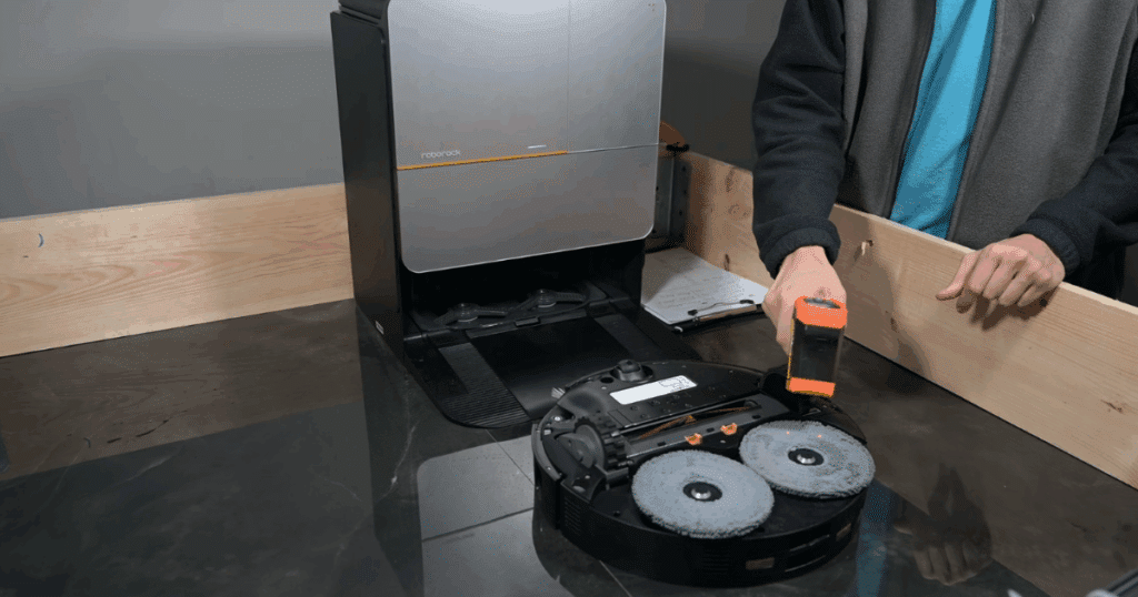 Roborock Z70 dock temperature | Vacuum Wars The Roborock Saros Z70 with its mop temperatures being tested at 114.1°F in the Vacuum Wars studio