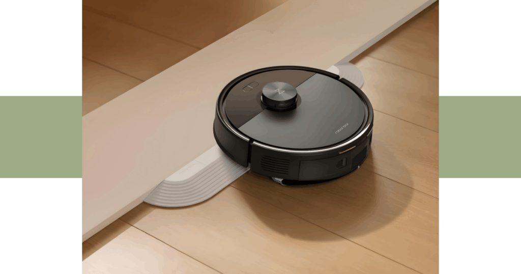 Roborock threshold ramp | Vacuum Wars Roborock robot vacuum crossing a doorway using a low-profile threshold ramp accessory, showing how ramps help robots clear floor transitions.