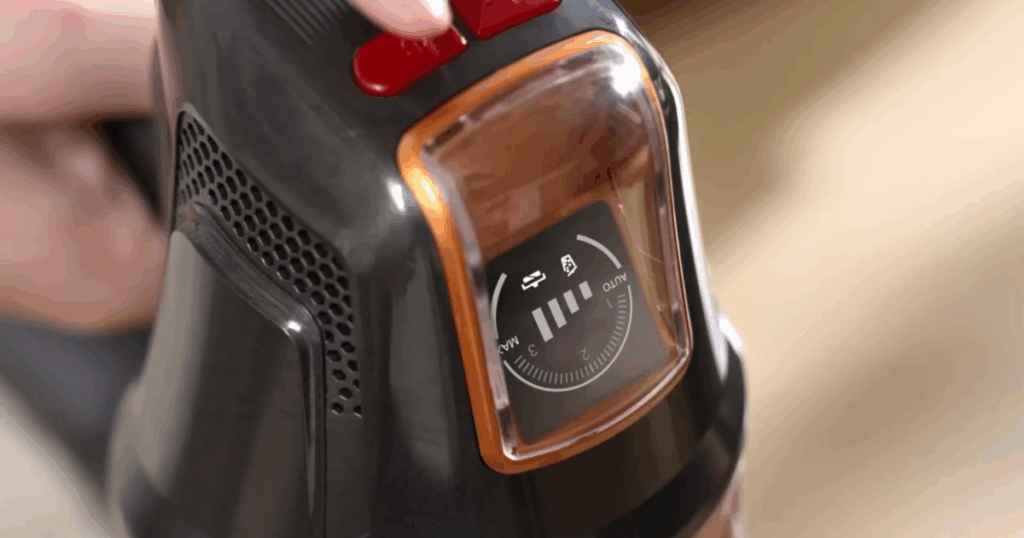 Close-up of the SMOTURE VAC03 cordless vacuum’s color LED display showing cleaning mode and system status indicators.