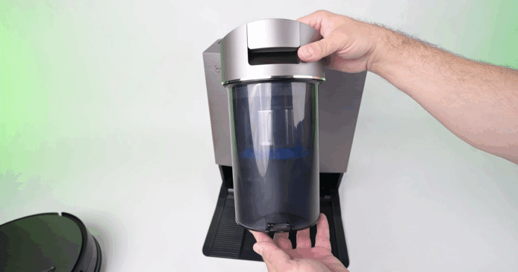 Ecovacs X11 CES bagless dust bin | Vacuum Wars The ECOVACS DEEBOT X11 OmniCyclone's pictured with its most distinctive feature, its bagless auto-empty dock.