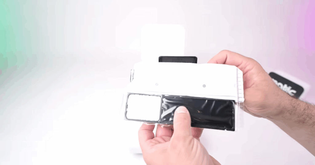 Matic bag | Vacuum Wars Hands holding the Matic robot vacuum specialized dust bag that stores both the wet and dry debris from cleaning and that we found can have odor issues despite measure to prevent them