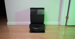 iRobot Chapter 11 | Vacuum Wars Robot vacuum and self-emptying dock photographed indoors for iRobot restructuring news