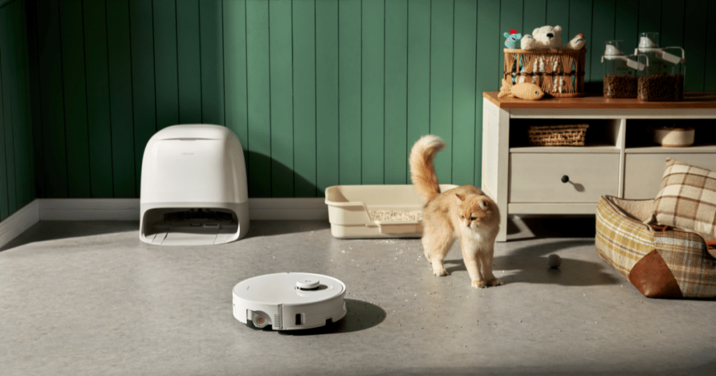 roborock qrevo curv 2 flow 1 | Vacuum Wars Roborock Qrevo Curv 2 Flow robot vacuum cleaning in a room with a cat, highlighting pet recognition features like reduced suction and “search for pet” mode.