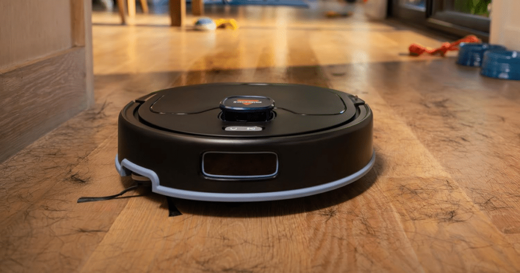 Bissell FlexClean FurForce | Vacuum Wars A close up of Bissell's FlexClean FurForce robot vacuum in action which Bissell claims has 2x more suction and 30% more pickup than their competitor, the Shark Matrix Plus 2-in-1