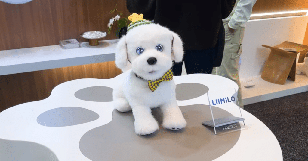 Ecovacs Lilmilo at CES 2026 | Vacuum Wars Ecovacs Li Milo robotic companion displayed at CES, designed with a pet-like appearance and expressive features.