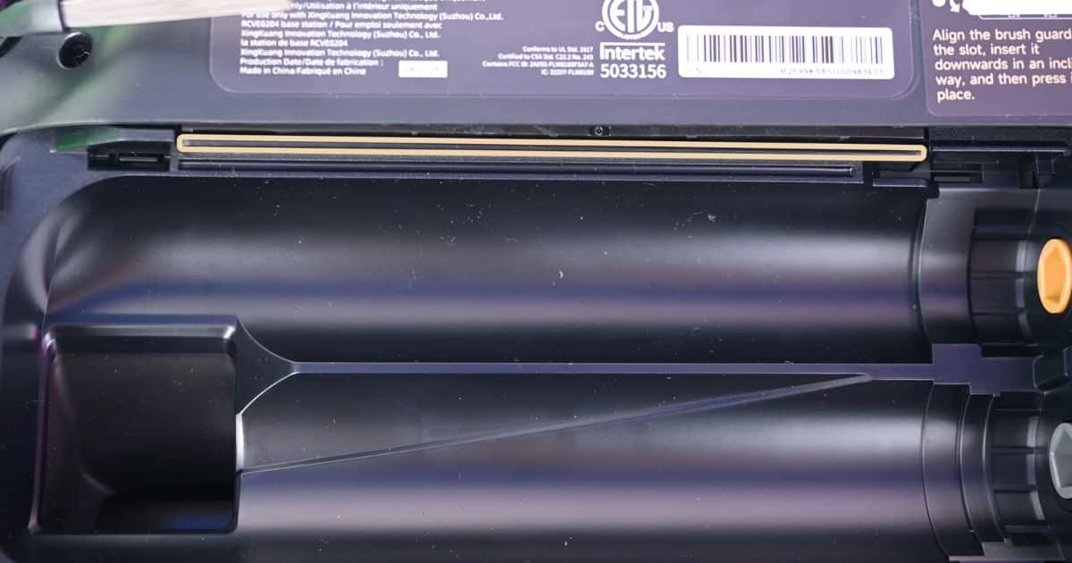 | Vacuum Wars Close-up of the Mobius 60’s underside intake area showing the pressure-retention baffle section above the roller housing.