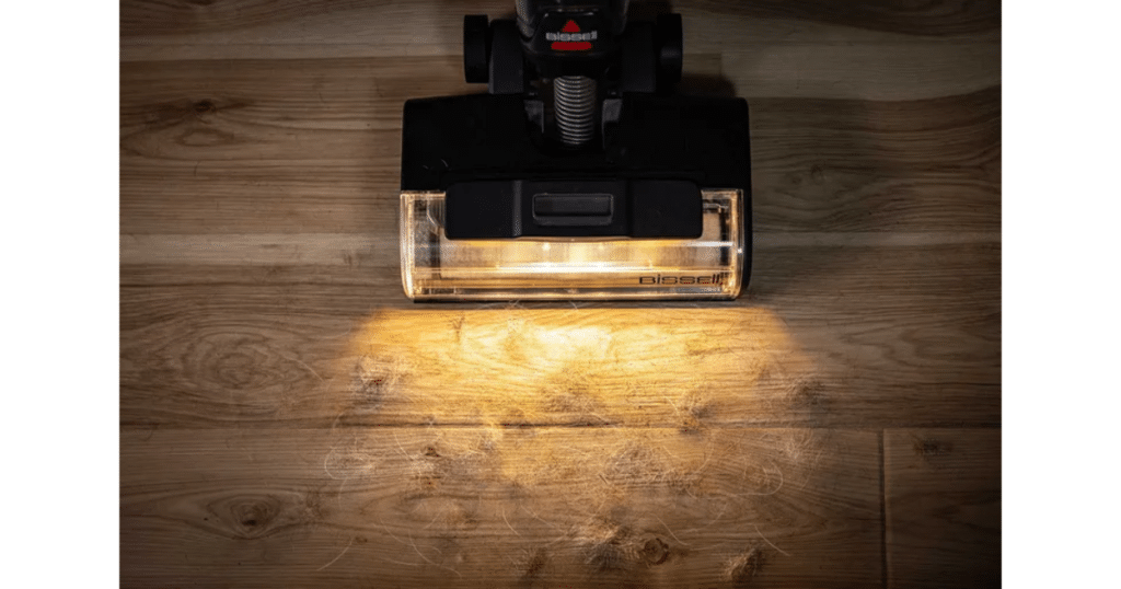 Bissell CrossWave HydroScrub FurFinder Headlights | Vacuum Wars Bissell CrossWave HydroScrub FurFinder headlights illuminating pet hair on a hard floor