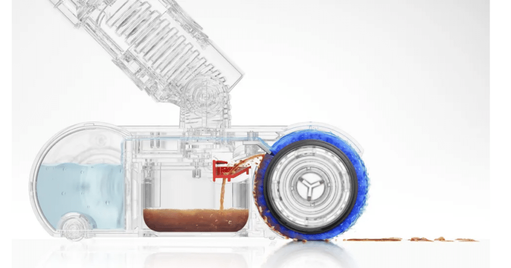 Dyson PencilVac Cleaner Head | Vacuum Wars Transparent cutaway view of the Dyson PencilWash cleaning head showing water tanks, internal fluid flow, and rotating microfibre roller.