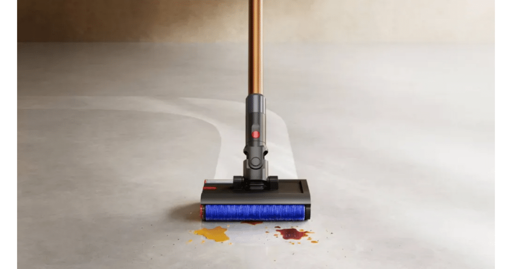 Dyson PencilVac Hard Floor Cleaner | Vacuum Wars Dyson PencilWash wet floor cleaner head removing spilled liquid from a hard floor surface.