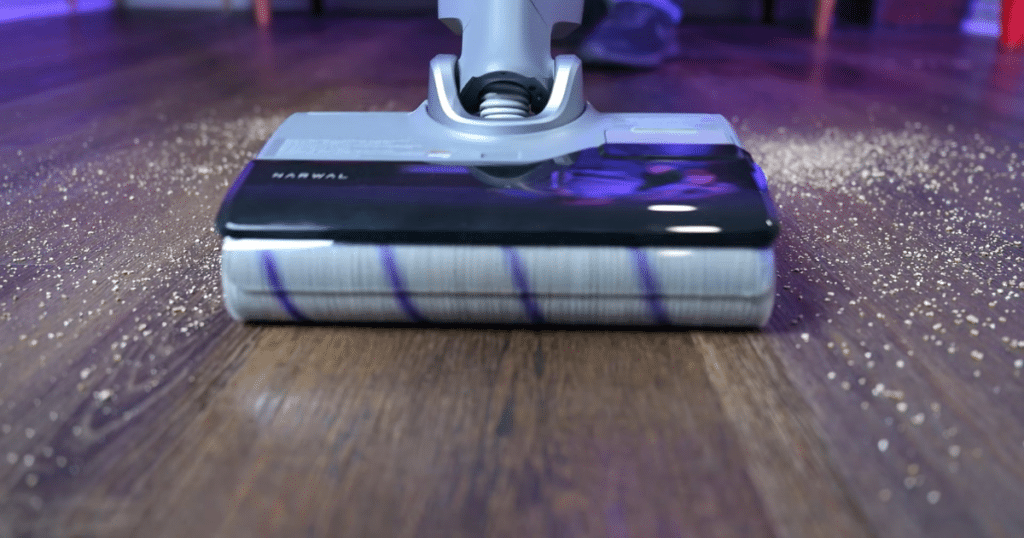 Narwal S20 pro dry debris mop | Vacuum Wars Narwal S20 Pro soft roller vacuum mop picking up dry debris while washing a hard floor at the same time.