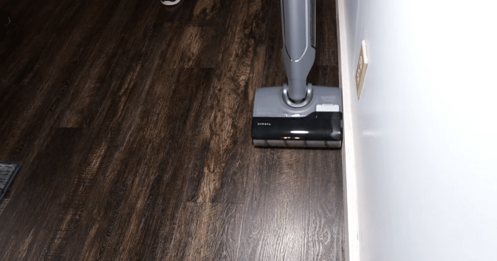 Narwal S20 pro edge | Vacuum Wars Narwal S20 Pro vacuum mop cleaning along a wall edge, showing side edge cleaning and self-propelled control on hard floors.