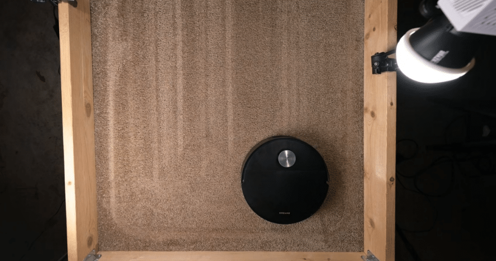 Dreame X60 Max Ultra Complete carpet deep clean | Vacuum Wars Dreame X60 Max Ultra Complete performing carpet deep clean test on medium pile carpet with embedded sand