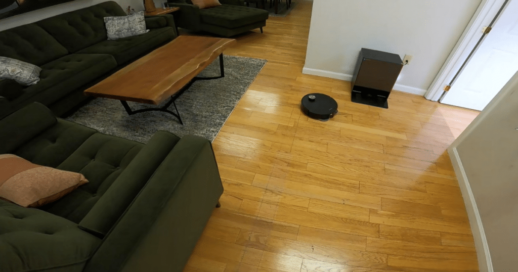 Dreame X60 Max Ultra Complete in studio | Vacuum Wars Dreame X60 Max Ultra Complete cleaning hardwood floors in living room during battery runtime test